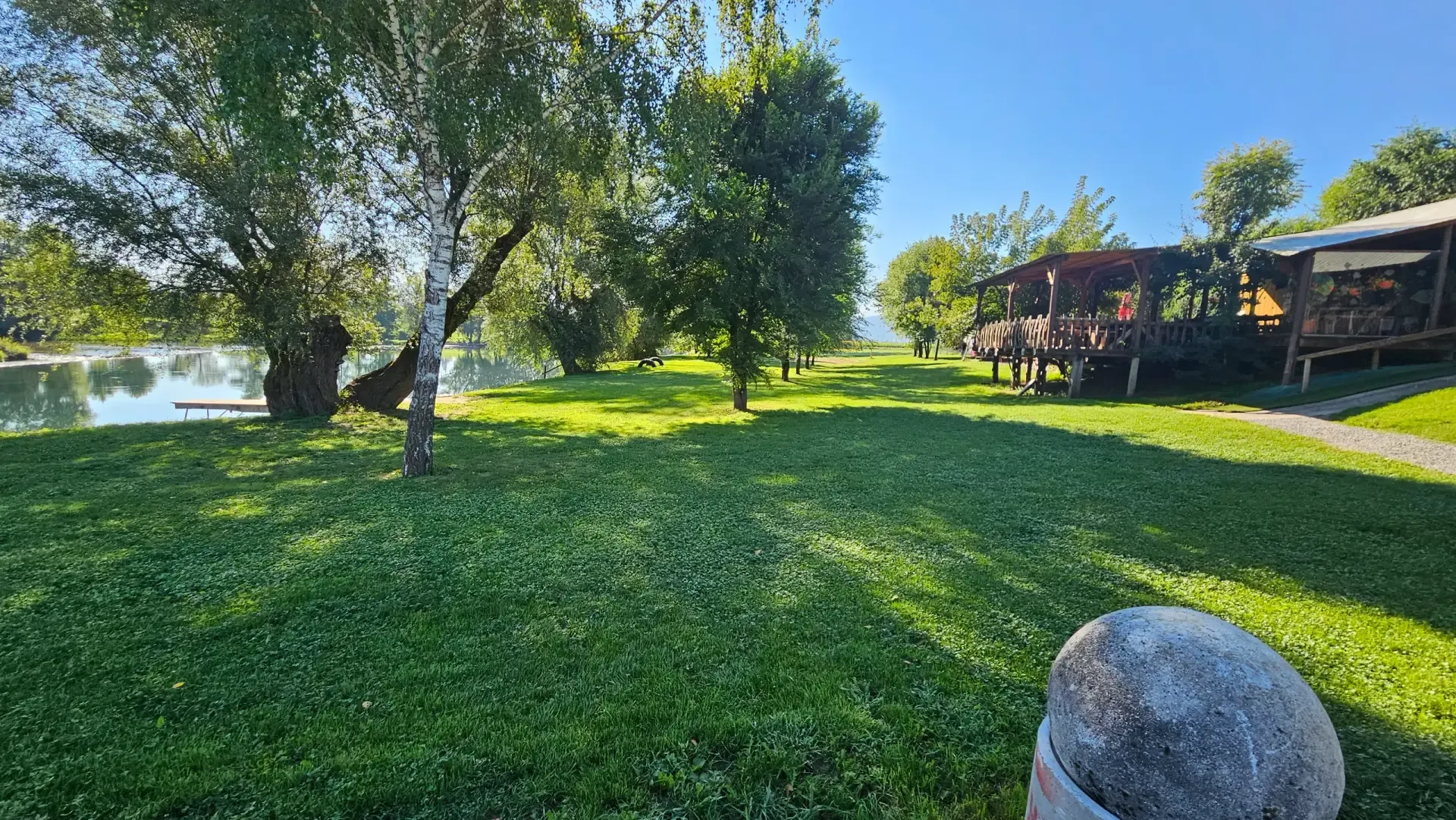 River bend with a swimming spot among trees